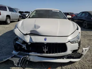 2017 Maserati Ghibli z VIN ZAM57XSAXH1248791, wystawiony jako Copart lot #55975084 z przebiegiem 80 926 mil mil oraz Czysty tytuł • Clean title. Historia ofert i sprzedaży dostępna na DreamBid. Obrazek 5.