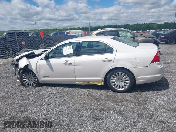 2011 Ford Fusion Hybrid with VIN 3FADP0L37BR264635, listed as a IAAI auction lot 42204672 with 147,326 mi miles and . Bid and sale history available at DreamBid. Image 15.