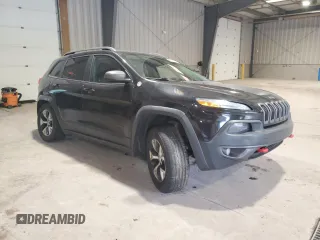 2016 Jeep Cherokee Trailhawk with VIN 1C4PJMBS4GW267375, listed as a Copart auction lot 58476005 with 116,151 mi miles and Salvage title. Bid and sale history available at DreamBid. Image 4.
