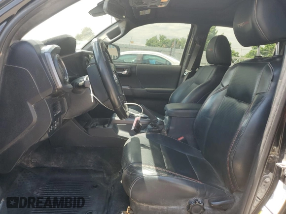 2019 Toyota Tacoma SR with VIN 5TFCZ5ANXKX184626, listed as a Copart auction lot 59220905 with 123,746 mi miles and Salvage title. Bid and sale history available at DreamBid. Image 7.