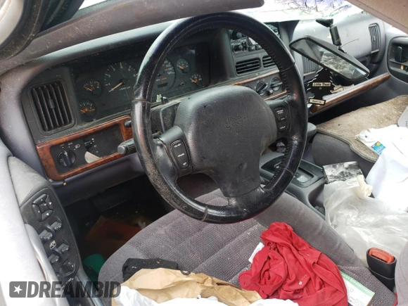 1996 Jeep Grand Cherokee Laredo with VIN 1J4GZ58S2TC401845, listed as a Copart auction lot 61013044 with 0 mi miles and Salvage Title. Bid and sale history available at carsss.com. Image 8.
