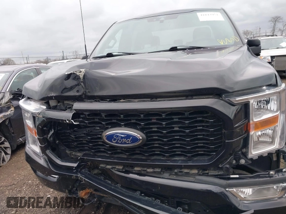 2021 Ford F-150 XL with VIN 1FTEW1EP9MKE37070, listed as a IAAI auction lot 41843951 with 69,679 mi miles and . Bid and sale history available at DreamBid. Image 12.