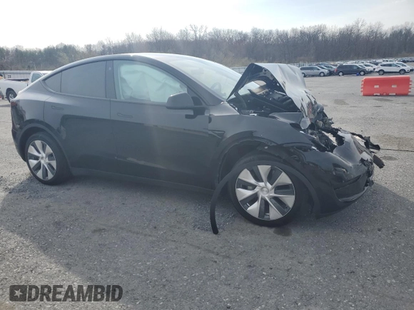 2022 Tesla Model Y Long Range with VIN 7SAYGAEE3NF310888, listed as a Copart auction lot 51361465 with Not Provided miles and Salvage Title. Bid and sale history available at carsss.com. Image 4.