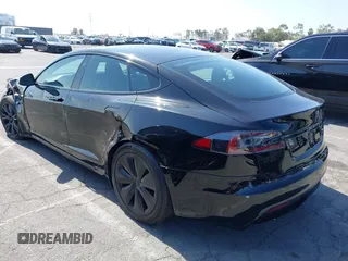 2022 Tesla Model S with VIN 5YJSA1E5XNF467435, listed as a IAAI auction lot 42538706 with 26,504 mi miles and . Bid and sale history available at DreamBid. Image 3.
