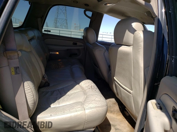 2002 Chevrolet Tahoe LT z VIN 1GNEK13T42R152851, wystawiony jako Copart lot #67958403 z przebiegiem 257 989 mil mil oraz Szkoda całkowita • Salvage title. Historia ofert i sprzedaży dostępna na DreamBid. Obrazek 11.