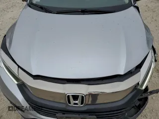 2021 Honda HR-V EX with VIN 3CZRU6H50MM705392, listed as a Copart auction lot 77876304 with 19,547 mi miles and Salvage Title. Bid and sale history available at carsss.com. Image 12.