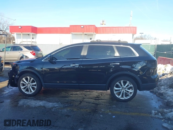 2011 Mazda CX-9 Grand Touring with VIN JM3TB3DV0B0304454, listed as a IAAI auction lot 41331484 with 221,985 mi miles. Bid and sale history available at carsss.com. Image 15.
