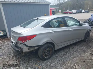 2014 Hyundai Accent GLS with VIN KMHCT4AE5EU597325, listed as a IAAI auction lot 42005445 with 1 mi miles. Bid and sale history available at carsss.com. Image 4.