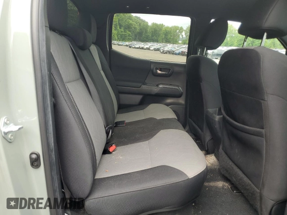 2022 Toyota Tacoma SR with VIN 3TMCZ5AN4NM528316, listed as a Copart auction lot 63259545 with 50,103 mi miles and Salvage title. Bid and sale history available at DreamBid. Image 10.