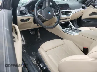 2023 BMW 4 Series 430i xDrive with VIN WBA43AT08PCM90476, listed as a Copart auction lot 50727785 with 11,677 mi miles and Salvage Title. Bid and sale history available at DreamBid. Image 8.