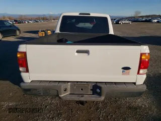 1999 Ford Ranger XLT with VIN 1FTYR10X8XUB20062, listed as a Copart auction lot 85779884 with 104,741 mi miles and Salvage title. Bid and sale history available at DreamBid. Image 6.