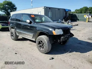 2008 Jeep Grand Cherokee Laredo with VIN 1J8GR48KX8C102393, listed as a Copart auction lot 69696834 with 173,049 mi miles and Salvage Title. Bid and sale history available at carsss.com. Image 12.