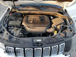 2019 Jeep Grand Cherokee Overland with VIN 1C4RJFCG4KC815786, listed as a Copart auction lot 49697865 with 171,655 mi miles and Salvage Title. Bid and sale history available at carsss.com. Image 14.