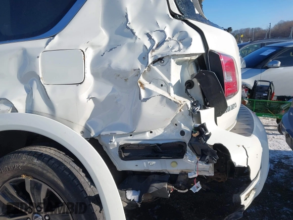 2019 Nissan Armada Platinum with VIN JN8AY2NE9K9759942, listed as a IAAI auction lot 41348179 with 114,902 mi miles. Bid and sale history available at carsss.com. Image 6.