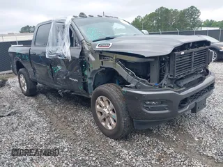2021 Ram 2500 Laramie with VIN 3C6UR5FL1MG561600, listed as a IAAI auction lot 42341595 with 71,387 mi miles and . Bid and sale history available at DreamBid. Image 1.