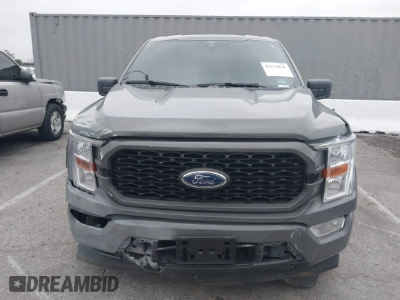 2021 Ford F-150 XL z VIN 1FTEW1CP1MKD41646, wystawiony jako IAAI lot #42174841 z przebiegiem 52 968 mil mil oraz . Historia ofert i sprzedaży dostępna na DreamBid. Obrazek 12.