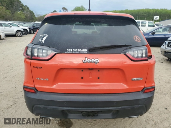 2021 Jeep Cherokee 80th Anniversary with VIN 1C4PJMMX9MD198733, listed as a Copart auction lot 51117895 with 53,561 mi miles and Salvage Title. Bid and sale history available at carsss.com. Image 6.