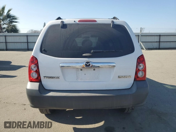 2005 Mazda Tribute i with VIN 4F2YZ02Z95KM24700, listed as a Copart auction lot 42002775 with 128,891 mi miles and Salvage Title. Bid and sale history available at carsss.com. Image 6.