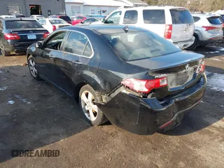 2009 Acura TSX with VIN JH4CU26639C017121, listed as a IAAI auction lot 41415582 with 273,583 mi miles. Bid and sale history available at carsss.com. Image 3.