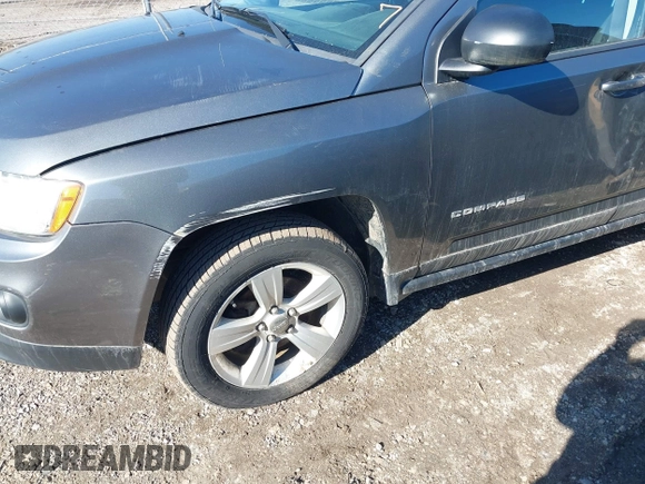 2012 Jeep Compass Latitude with VIN 1C4NJDEBXCD563543, listed as a IAAI auction lot 41711187 with 149,100 mi miles. Bid and sale history available at carsss.com. Image 6.