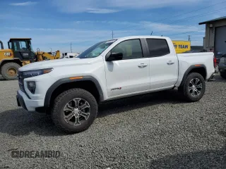 2024 GMC Canyon 4WD AT4 z VIN 1GTP6DEK8R1319281, wystawiony jako Copart lot #54380285 z przebiegiem 2383 mil mil oraz Szkody całkowita. Historia ofert i sprzedaży dostępna na DreamBid. Obrazek 1.