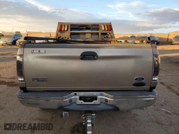 2002 Ford F-150 XL with VIN 1FTRF18262NB35586, listed as a Copart auction lot 77114114 with 166,942 mi miles and Salvage title. Bid and sale history available at DreamBid. Image 6.