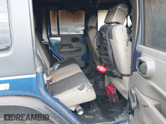 2007 Jeep Wrangler Unlimited X with VIN 1J4GA39167L138041, listed as a IAAI auction lot 42113260 with Not provided miles and . Bid and sale history available at DreamBid. Image 8.