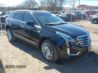 2017 Cadillac XT5 Premium Luxury FWD z VIN 1GYKNCRS8HZ127001, wystawiony jako IAAI lot #41698197 z przebiegiem 120 978 mil mil oraz . Historia ofert i sprzedaży dostępna na DreamBid. Obrazek 1.