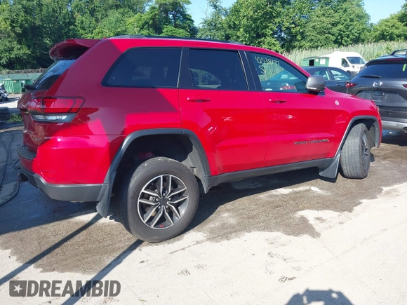 2021 Jeep Grand Cherokee Trailhawk with VIN 1C4RJFLG8MC549403, listed as a IAAI auction lot 42538177 with 33,124 mi miles and . Bid and sale history available at DreamBid. Image 4.