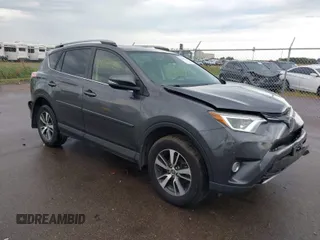 2018 Toyota RAV4 XLE with VIN JTMRFREV0JJ239557, listed as a IAAI auction lot 40197325 with 90,321 mi miles. Bid and sale history available at carsss.com. Image 1.