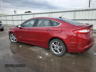 2015 Ford Fusion Titanium Hybrid with VIN 3FA6P0RUXFR247357, listed as a Copart auction lot 55943975 with 112,278 mi miles and Salvage title. Bid and sale history available at DreamBid. Image 2.