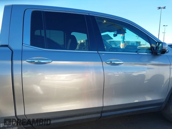 2022 Honda Ridgeline RTL-E with VIN 5FPYK3F78NB016045, listed as a IAAI auction lot 41626864 with 57,130 mi miles and . Bid and sale history available at DreamBid. Image 14.