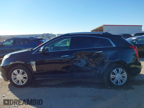 2016 Cadillac SRX Luxury Collection with VIN 3GYFNEE39GS583306, listed as a IAAI auction lot 41312161 with 98,831 mi miles. Bid and sale history available at carsss.com. Image 6.