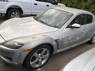 2004 Mazda RX-8 with VIN JM1FE17N540130784, listed as a Copart auction lot 76628734 with 122,806 mi miles and Clean Title. Bid and sale history available at carsss.com. Image 2.