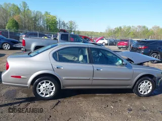2000 Nissan Maxima GXE z VIN JN1CA31D5YT501086, wystawiony jako IAAI lot #41982095 z przebiegiem 184 012 mil mil oraz . Historia ofert i sprzedaży dostępna na DreamBid. Obrazek 14.