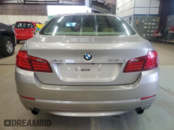 2013 BMW 5 Series 535i xDrive with VIN WBAFU7C57DDU74909, listed as a Copart auction lot 64053715 with 115,521 mi miles and Clean title. Bid and sale history available at DreamBid. Image 6.