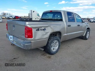 2005 Dodge Dakota SLT with VIN 1D7HW48N45S199371, listed as a IAAI auction lot 41792900 with 170,893 mi miles. Bid and sale history available at carsss.com. Image 4.