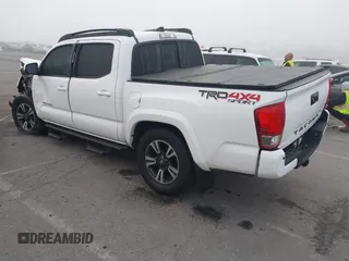 2016 Toyota Tacoma SR with VIN 3TMCZ5AN0GM030469, listed as a IAAI auction lot 41665255 with 178,591 mi miles and . Bid and sale history available at carsss.com. Image 3.