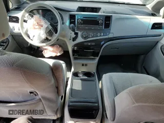 2014 Toyota Sienna LE AAS with VIN 5TDKK3DC6ES497746, listed as a Copart auction lot 56125845 with 142,596 mi miles and Salvage Title. Bid and sale history available at DreamBid. Image 8.