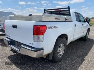 2011 Toyota Tundra with VIN 5TFUY5F1XBX198815, listed as a IAAI auction lot 42571444 with 281,114 mi miles and . Bid and sale history available at DreamBid. Image 28.