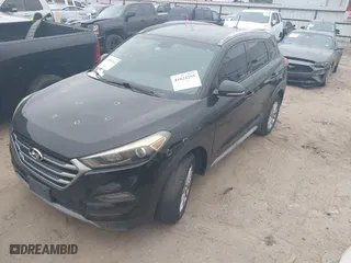 2017 Hyundai Tucson Value with VIN KM8J33A27HU388910, listed as a IAAI auction lot 41101112 with 107,138 mi miles. Bid and sale history available at carsss.com. Image 2.