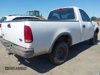 1997 Ford F-150 with VIN 1FTDF18W1VKC71272, listed as a IAAI auction lot 42736151 with 160,730 mi miles and . Bid and sale history available at DreamBid. Image 4.
