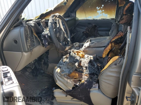 2003 Chevrolet Tahoe LS with VIN 1GNEC13Z73J108781, listed as a Copart auction lot 59370715 with Not provided miles and Salvage title. Bid and sale history available at DreamBid. Image 7.