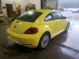 2014 Volkswagen Beetle 2.5L w/Sun with VIN 3VWJP7AT7EM605961, listed as a Copart auction lot 64607651 with 60,819 mi miles and Salvage Title. Bid and sale history available at DreamBid. Image 4.