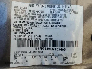 2004 Ford Focus SE with VIN 1FAFP34304W165468, listed as a Copart auction lot 45719985 with 208,259 mi miles and Salvage title. Bid and sale history available at DreamBid. Image 12.
