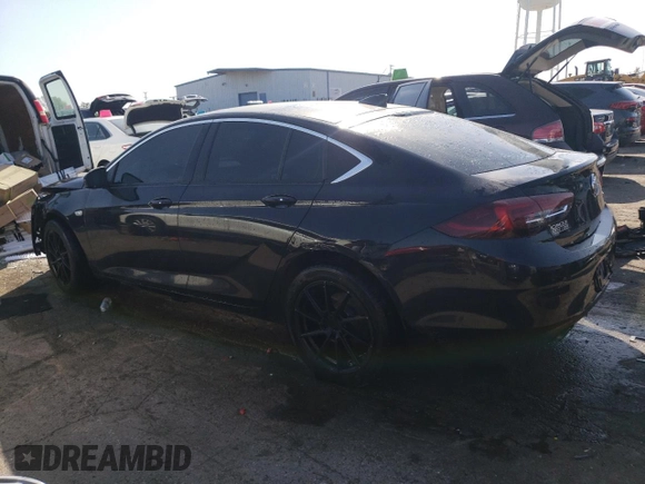 2019 Buick Regal Essence with VIN W04GP6SX0K1030338, listed as a Copart auction lot 74726264 with 148,531 mi miles and Salvage title. Bid and sale history available at DreamBid. Image 2.