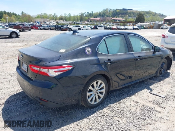 2019 Toyota Camry LE z VIN 4T1B11HK7KU269928, wystawiony jako IAAI lot #42048750 z przebiegiem 102 585 mil mil oraz . Historia ofert i sprzedaży dostępna na DreamBid. Obrazek 4.