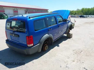 2007 Dodge Nitro SXT z VIN 1D8GU28K07W565166, wystawiony jako IAAI lot #42343272 z przebiegiem 152 813 mil mil oraz . Historia ofert i sprzedaży dostępna na DreamBid. Obrazek 4.