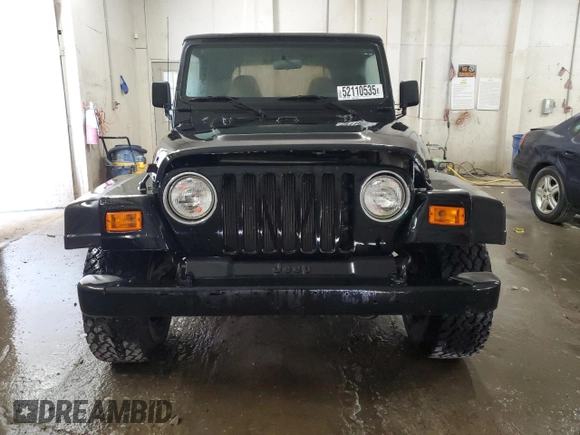 1997 Jeep Wrangler Sport with VIN 1J4FY19S6VP457417, listed as a Copart auction lot 52110535 with 106,129 mi miles and Salvage Title. Bid and sale history available at carsss.com. Image 5.