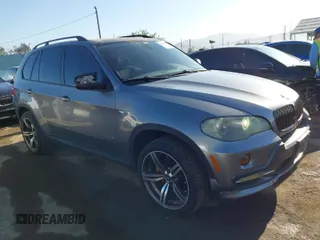 2009 BMW X5 30i with VIN 5UXFE43559L263332, listed as a IAAI auction lot 41998651 with 209,264 mi miles. Bid and sale history available at carsss.com. Image 1.